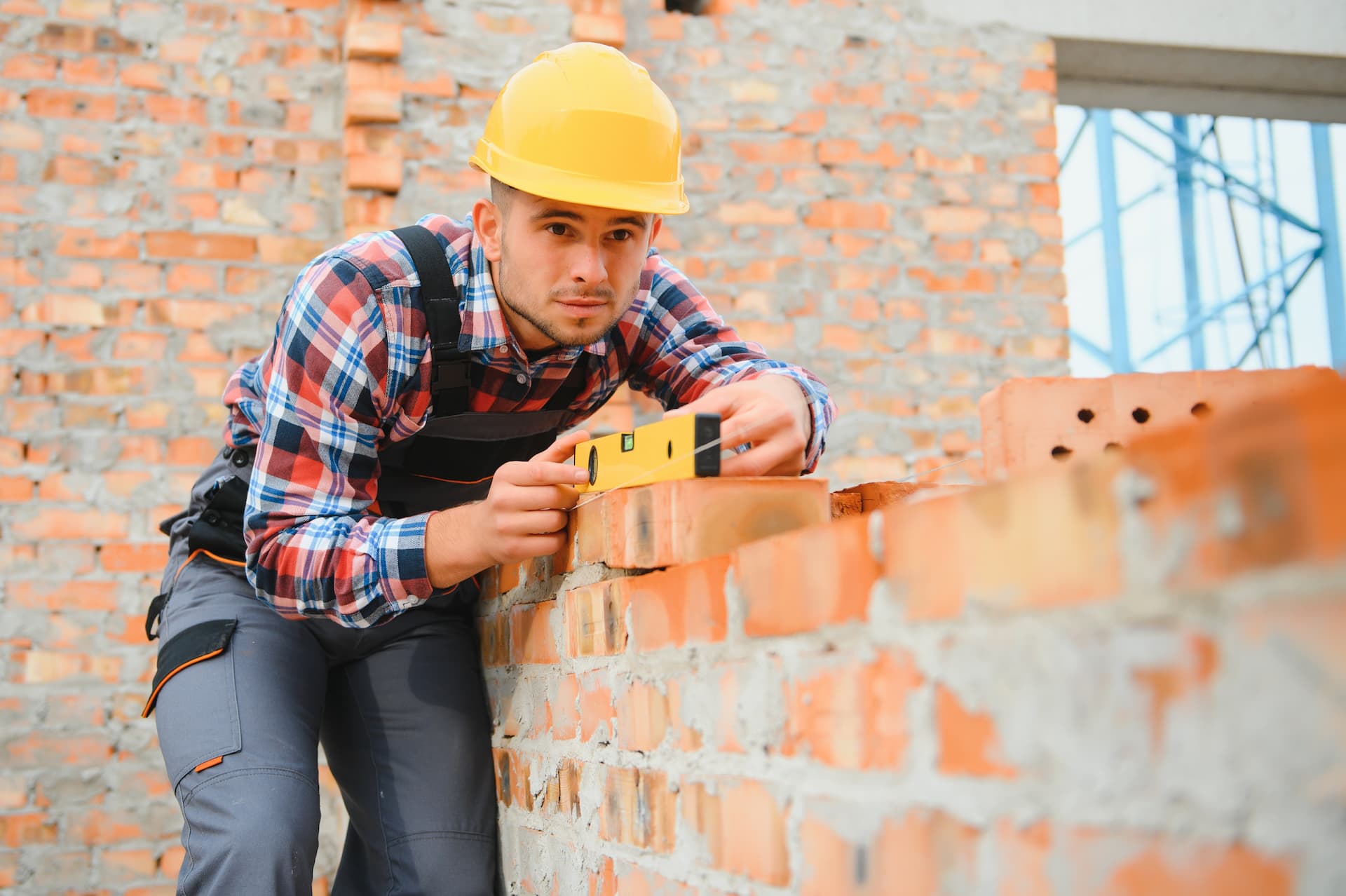 Masonry leveling brick wall